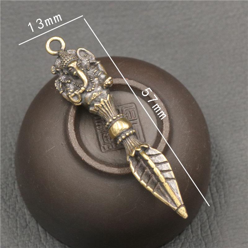 Messing Vajra Stößel Schlüsselanhänger: Goldener tantrischer Anhänger & kleines Ornament