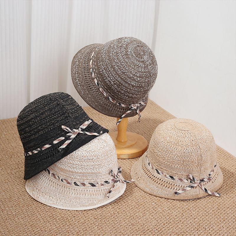 French elegant woven bucket hat women's spring and summer thin hollow breathable sunscreen visor showing face small holiday basin hat