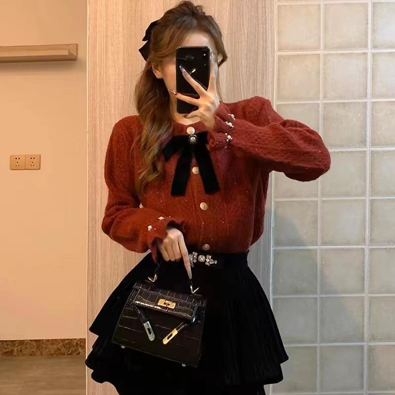New light ripe women's clothing bow trendy jacket knitted cardigan women's niche design sense gentle bright silk sweater