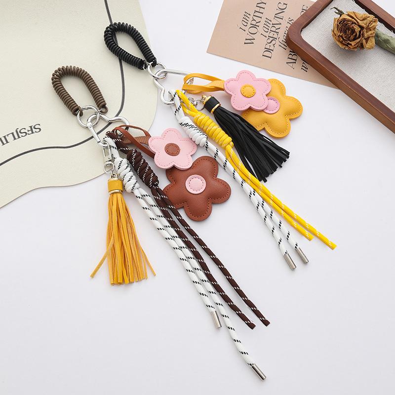 Yogodlns 1Pcs Fashion Faux Leather Flower Tassel Braided Rope Bag Charms Pendant For Women Handbag