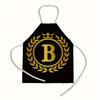 1 personalized letter apron with golden crown print on a black background, suitable for kitchen baking and barbecue