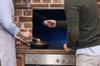 GLASS PROTECTIVE PLATE FOR STOVE 90x52 BLACK