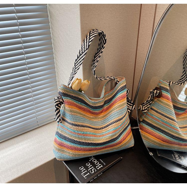 

Bohemian woven straw bag women s large-capacity new casual shoulder seaside vacation beach bag разноцветный