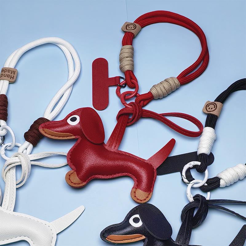 Breloc Piele Teckel Pui & Șnur Telefon