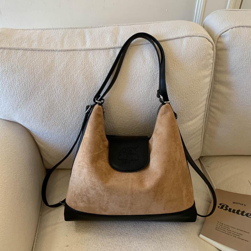 

Wholesale portable shoulder bag, matte texture, fashionable contrasting color tote bag, new large-capacity casual backpack.