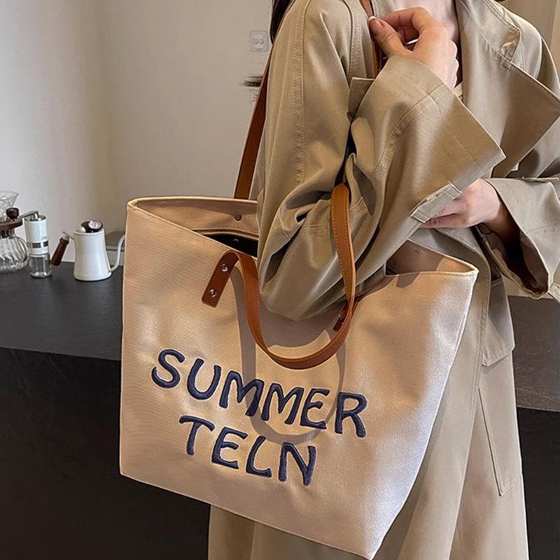 Bag Women's 2026 New Fashion Large Capacity Commuter Casual Versatile Single Shoulder College Student Class Tote Bag