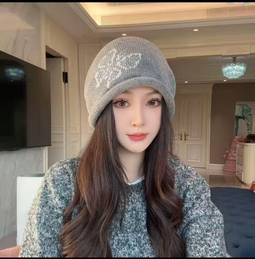 2025 new crimping drawstring stacking hat showing a small face knitted autumn and winter warm ear protection hat women's cold hat Baotou hat