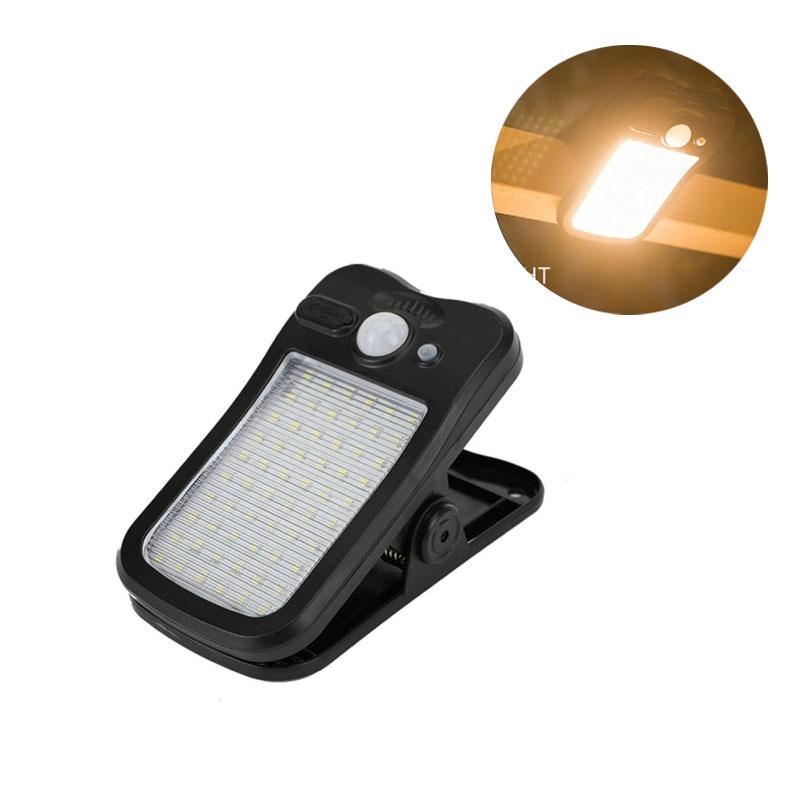 

Clip-on LED Solar Light Smart Human Induction Outdoor Garden Light Waterproof Outdoor Lamp for Tent Garage Courtyard High Bright black shell-warm,1pc