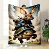 A Cheerful Rabbit Rides a Rocket-powered Turtle Through a Rural Sky. for All Seasons Blanket Lunch Break Throw Gift