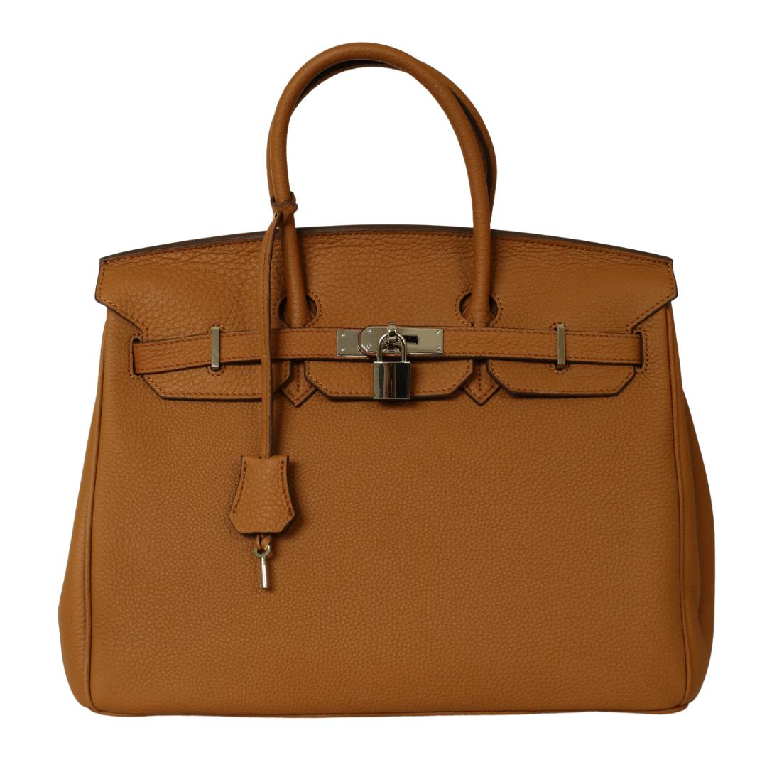 

Модель женской сумки из натуральной кожи ограниченного выпуска