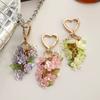 Ornements Porte-clés en Forme de Cœur Élégant Pendentif Fleur Porte-clés Charme à Suspendre pour Sac Quotidien