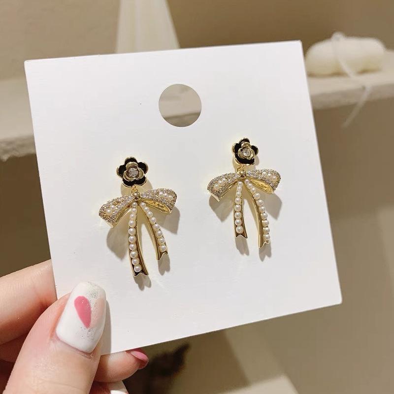 Millet Bead Bow Earrings with Camellia Design - S925 Silver, Elegant & Luxurious. Electroplated