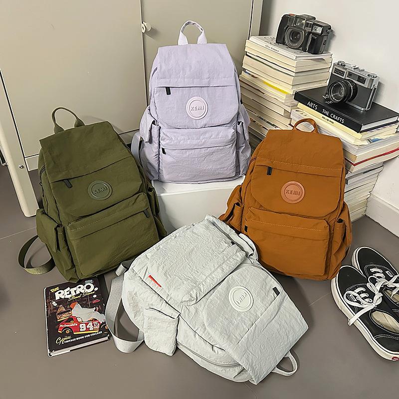 New Japanese outdoor lightweight fashion schoolbag backpack small backpack women's simple and versatile new travel schoolbag women