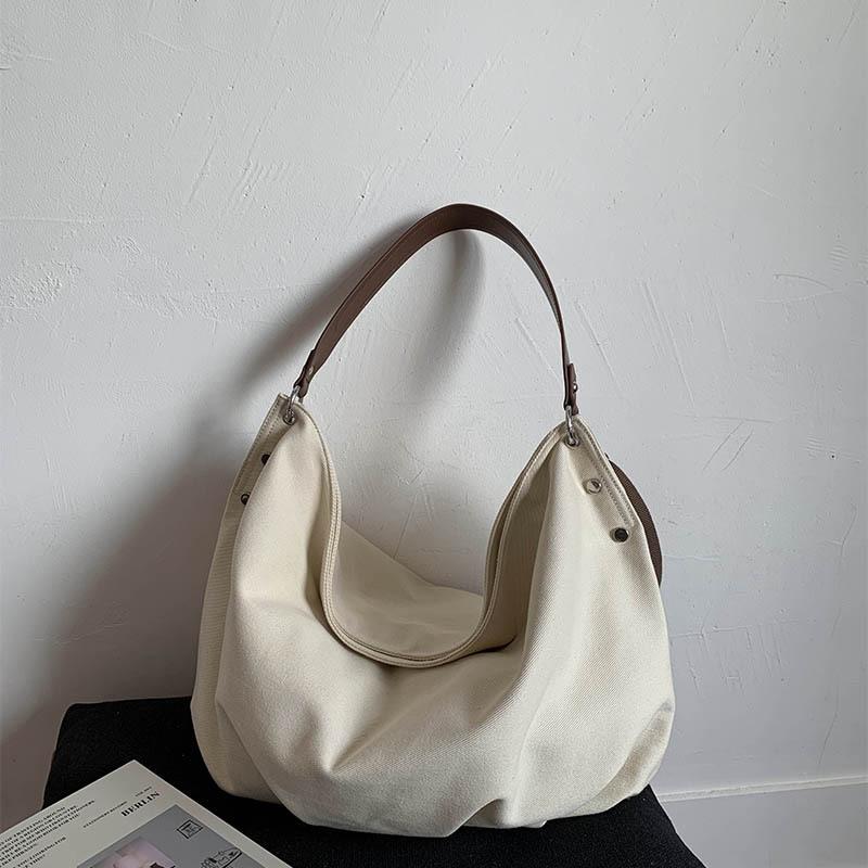 

Large capacity canvas bag women s autumn and winter versatile new casual pleated shoulder crossbody commuter tote bag белый