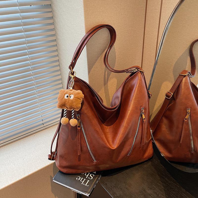 Женский ретро-рюкзак 2025 года в стиле кроссбоди большая вместимость универсальный для поездок на работу коричневый 1845₽