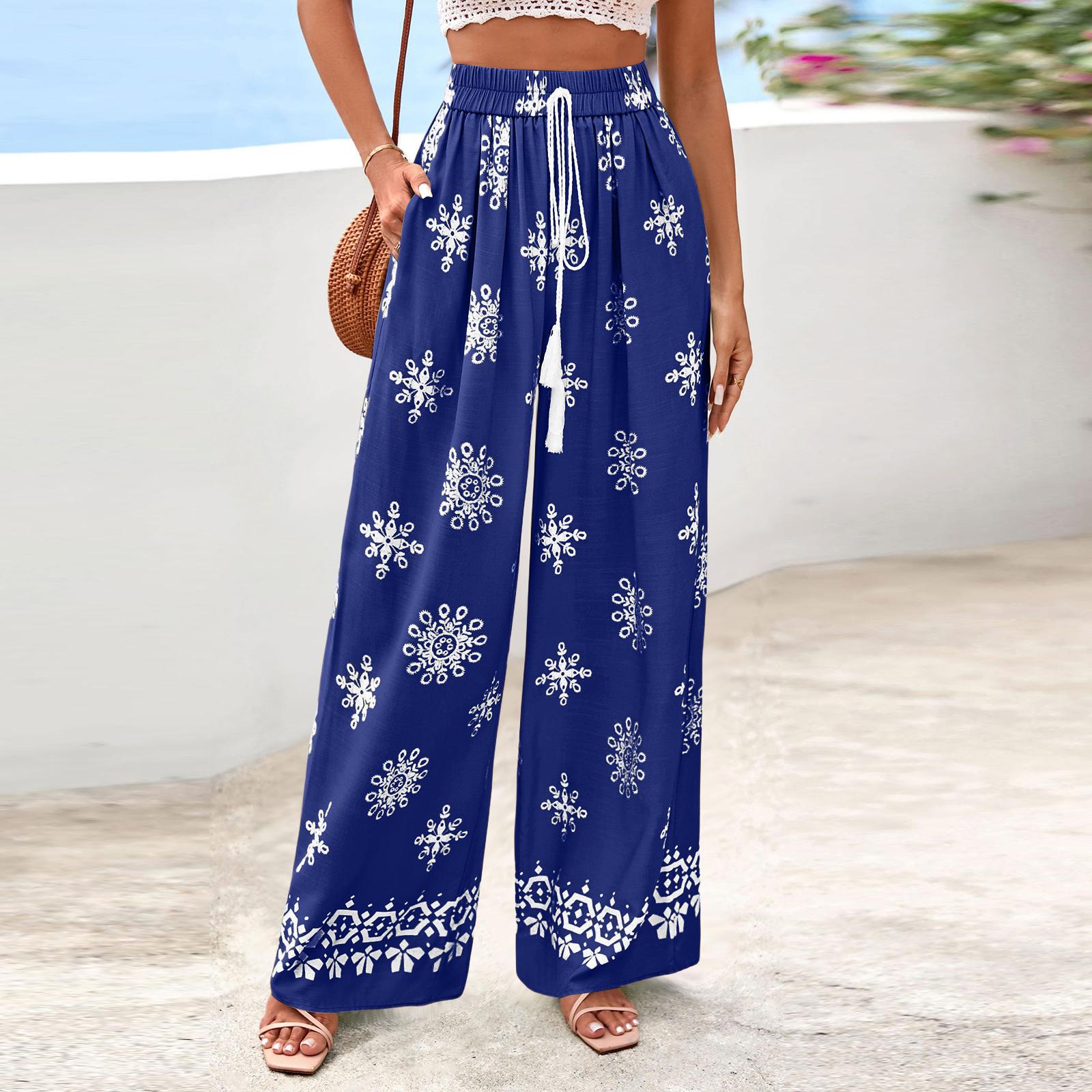 Женские широкие повседневные струящиеся брюки в цветочек M