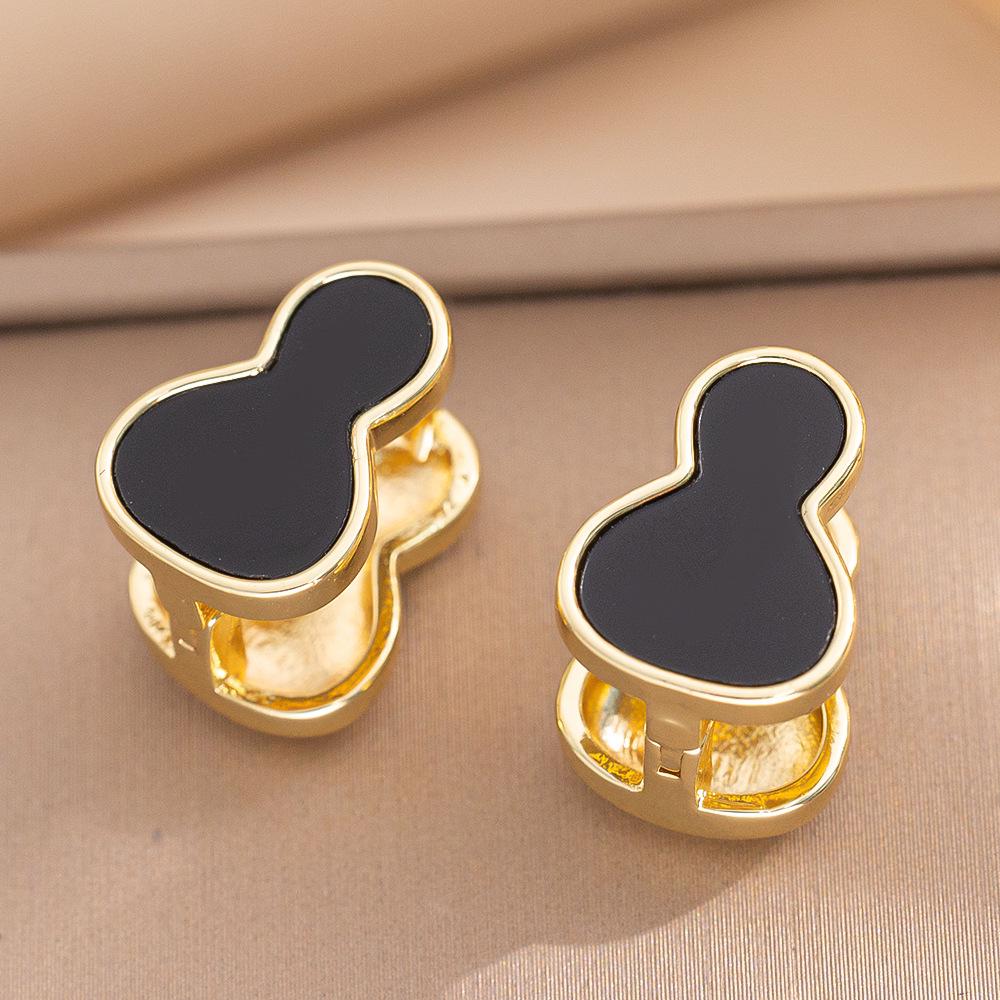 Eleganckie kolczyki sztyfty z cyrkoniami w kształcie koniczynki i misia - Nowy szykowny design