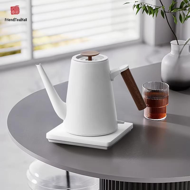 Youmingtang Black & White Electric Kettle: Fast Boiling for Home, Tea Brewing, Water Heating, and Hotel Use.