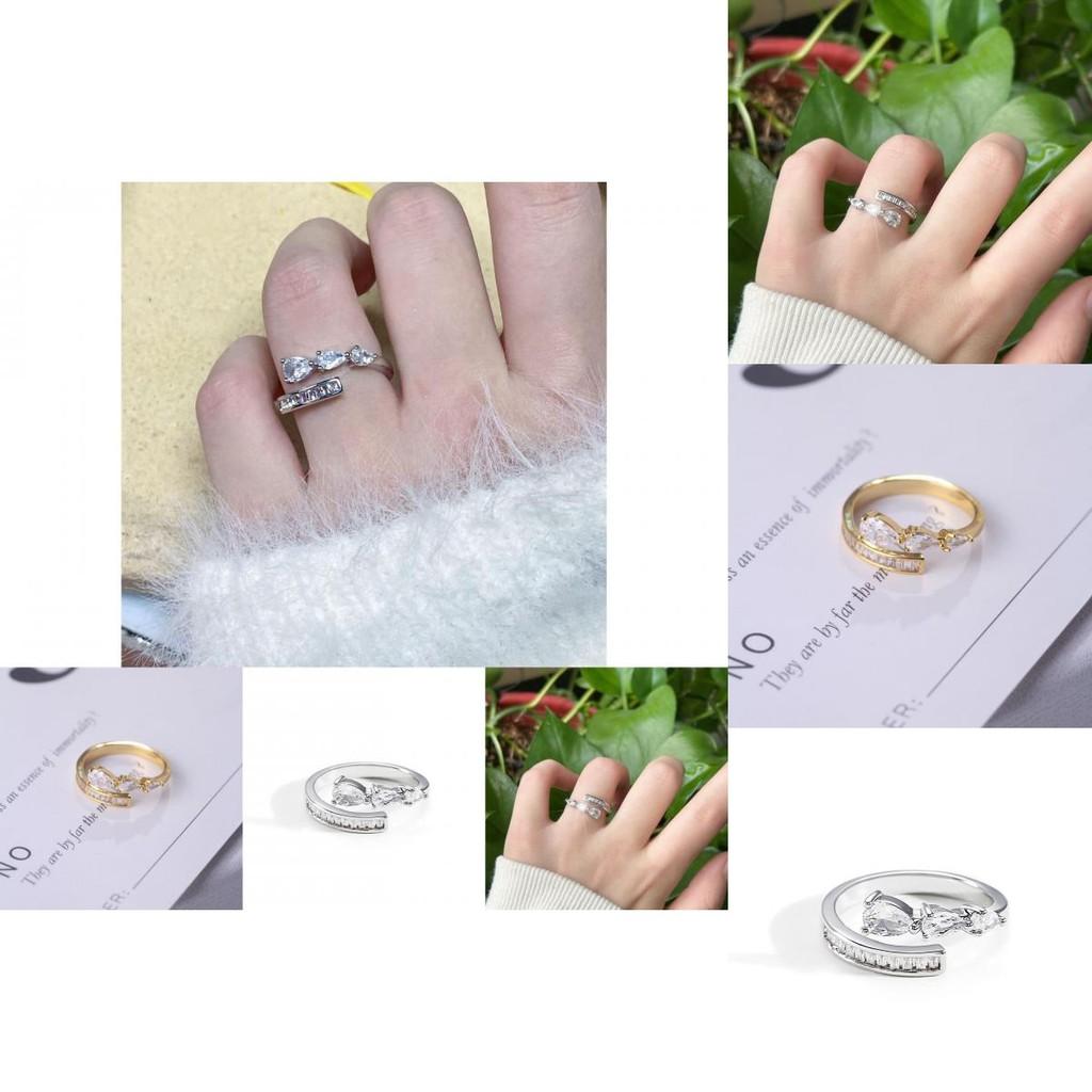 Stylish Women's Open Ring With Dazzling Zircon Stone Accents And Contemporary Water Drop Design