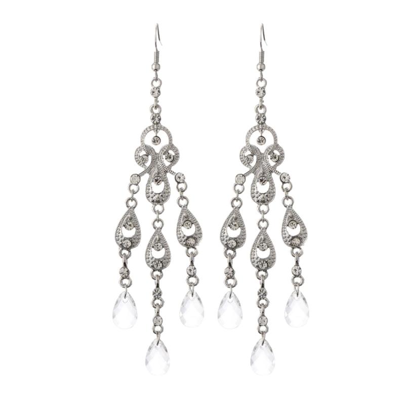 

Легкие полые серьги-капли с кристальными деталями, надежная застежка-крючок. Идеально подходят для вечеринок, свадеб, особых случаев.