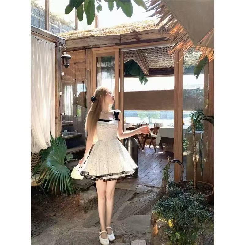 Women's French Retro Polka Dot Spaghetti Strap Dress - Elegant Summer Style with Waist-Cinch and Long, Slimming Hem