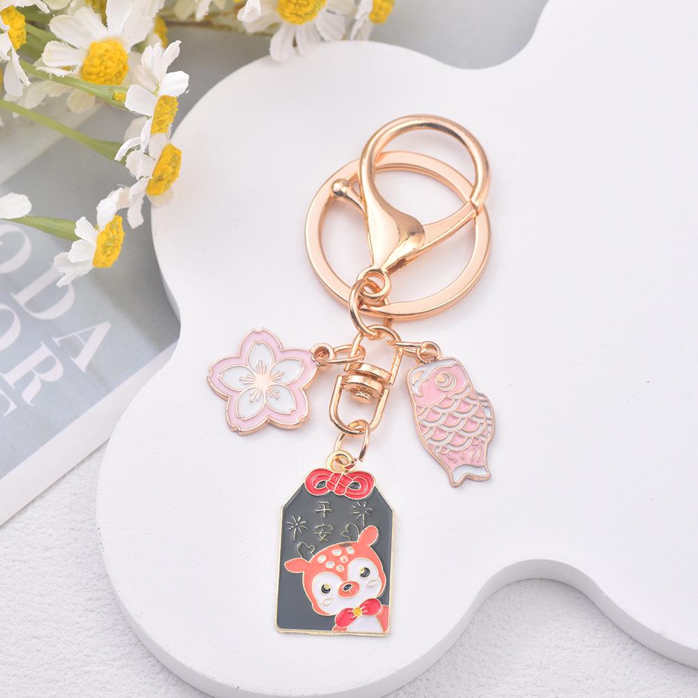 Japanese Sakura Koi Omamori Amulet Keychain for Luck, Wealth & Safety - Charming Couple's Accessory
