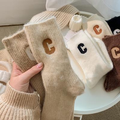 Calzini di lana da donna di lusso caldo inverno spesso cashmere casual moda giapponese tinta unita comodo calzino da casa lungo di alta qualità