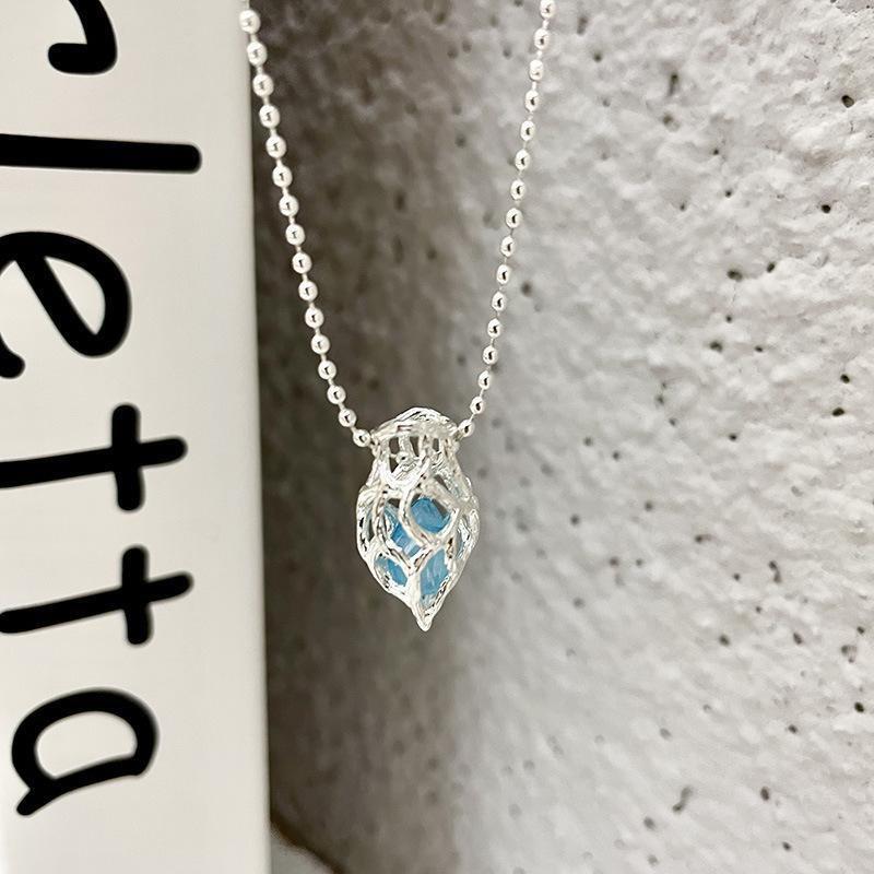 

Голубой лед кулон аквамарин гравий ожерелье женский темперамент голубой кристалл кулон ключица цепочка