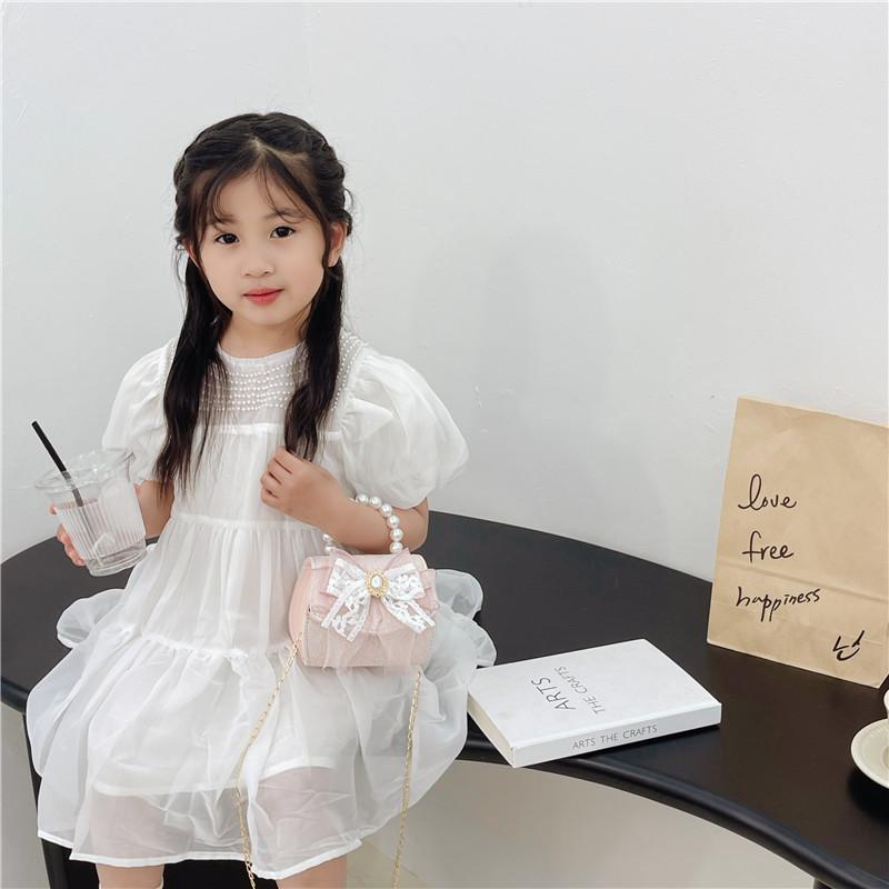 Stylish Children's Pearl Handbag With Bow Design Perfect For Mini Fashionistas And Daily Outings