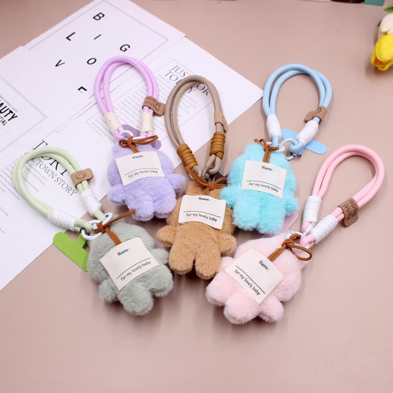 Puppenanhänger, Rucksackanhänger, Damenhandtaschenanhänger, Handyhüllenanhänger.