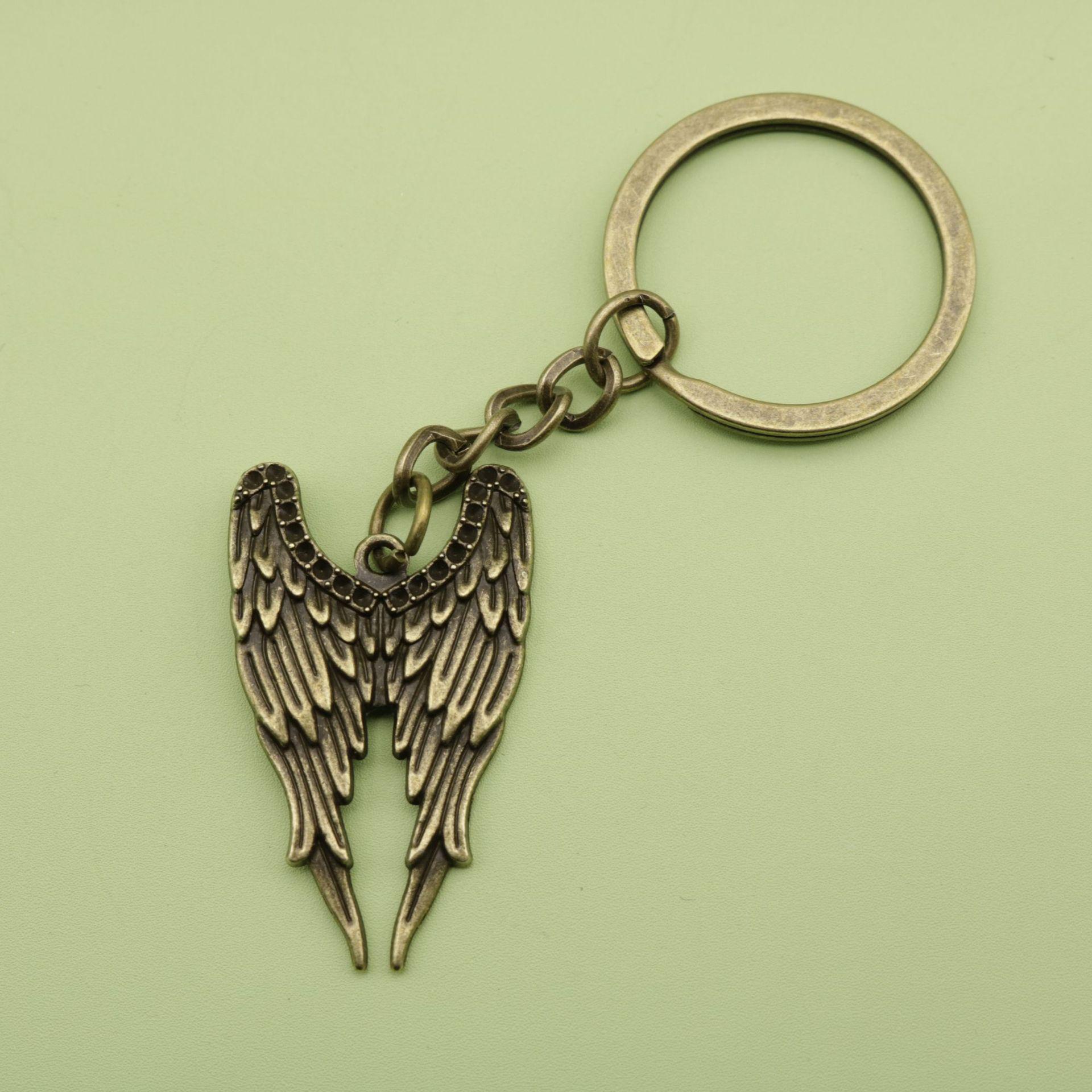 Hot Selling: Simple Wing Feather Keychain Pendant