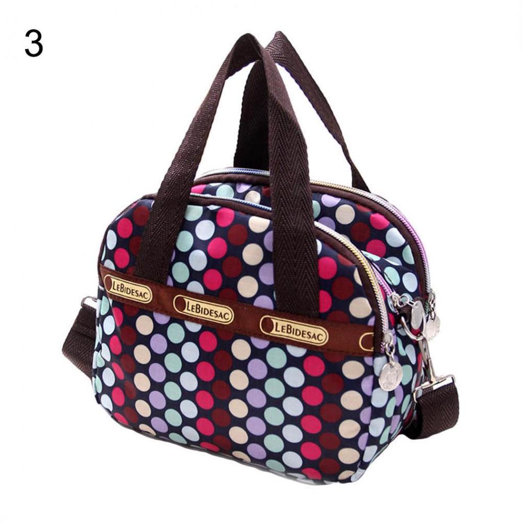 Handtasche mit mehreren Taschen und Reißverschluss und mehrfarbigem Blumendruck für Damen