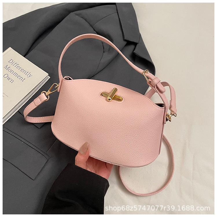 

2025 new solid color temperament handbag large-capacity women s bag niche casual one-shoulder real high-end messenger bag розовый