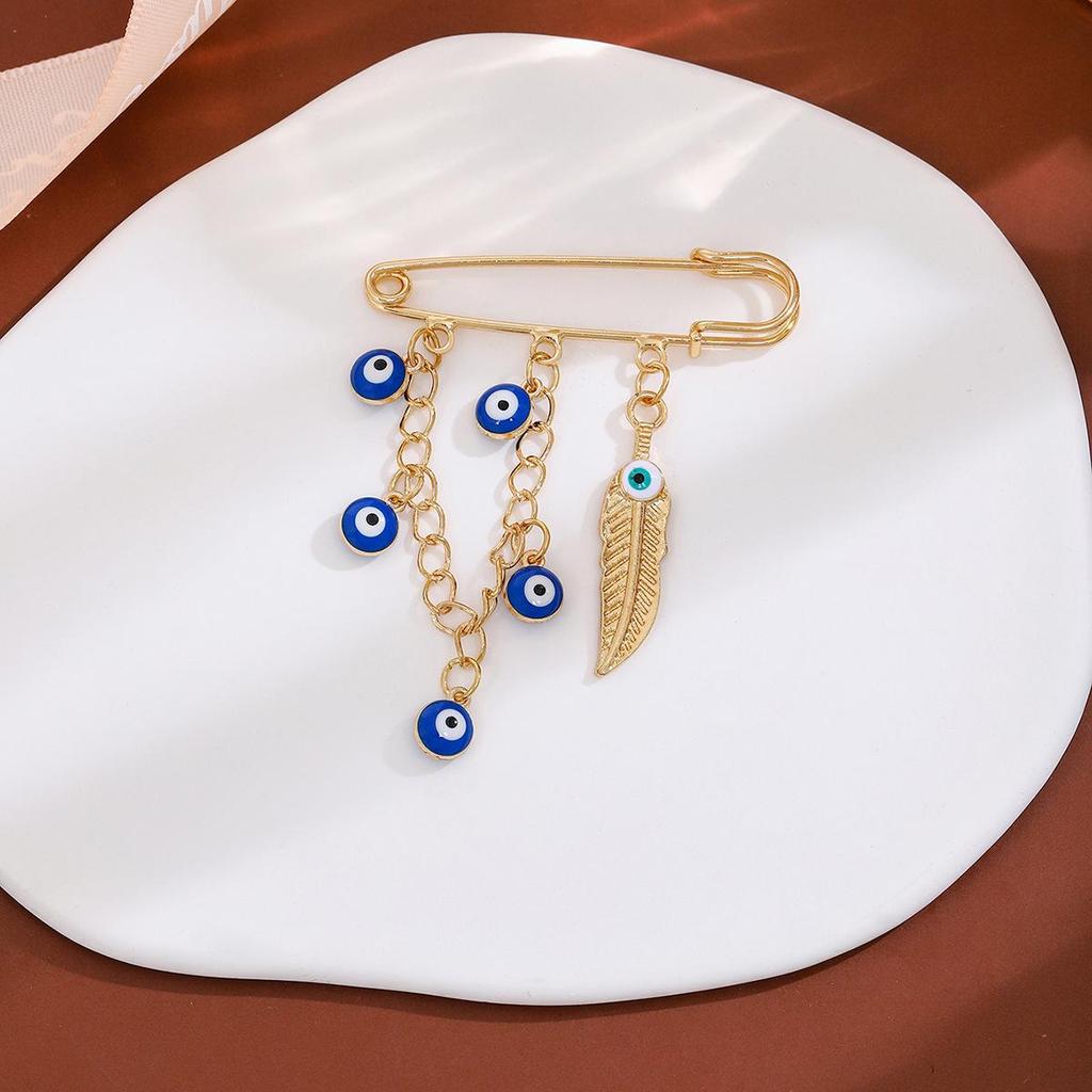 Creative Rhinestone Devil's Eye Tassel Brooch: Women's High-End Blue-Eyes Sweater Pin