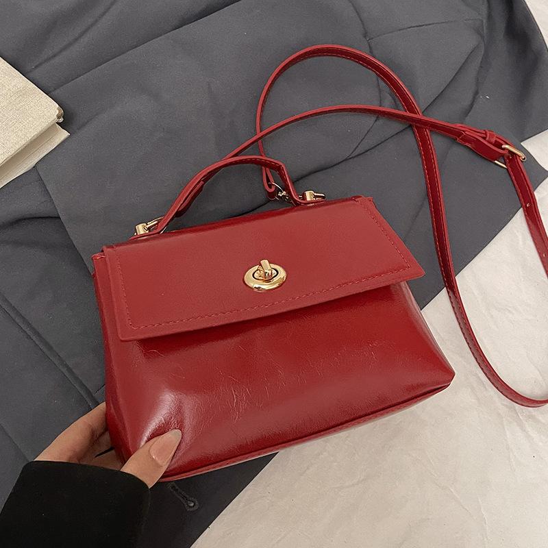 French simple high-end temperament oil wax leather portable small square bag women's commuting versatile solid color casual style messenger bag