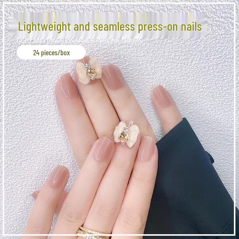 

Handmade Wearable Nail Art: Short Nude Bow Nail Tips in Simple Versatile Style Gold Plating Glue Type