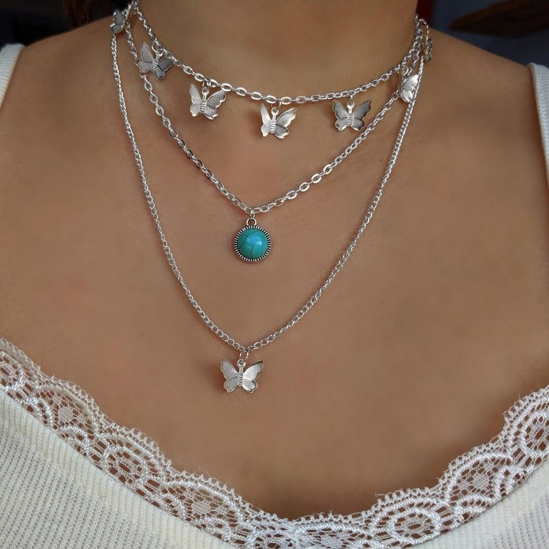 

Turquoise Butterfly Pendant Multi-layer Necklace with Simple Personality Design