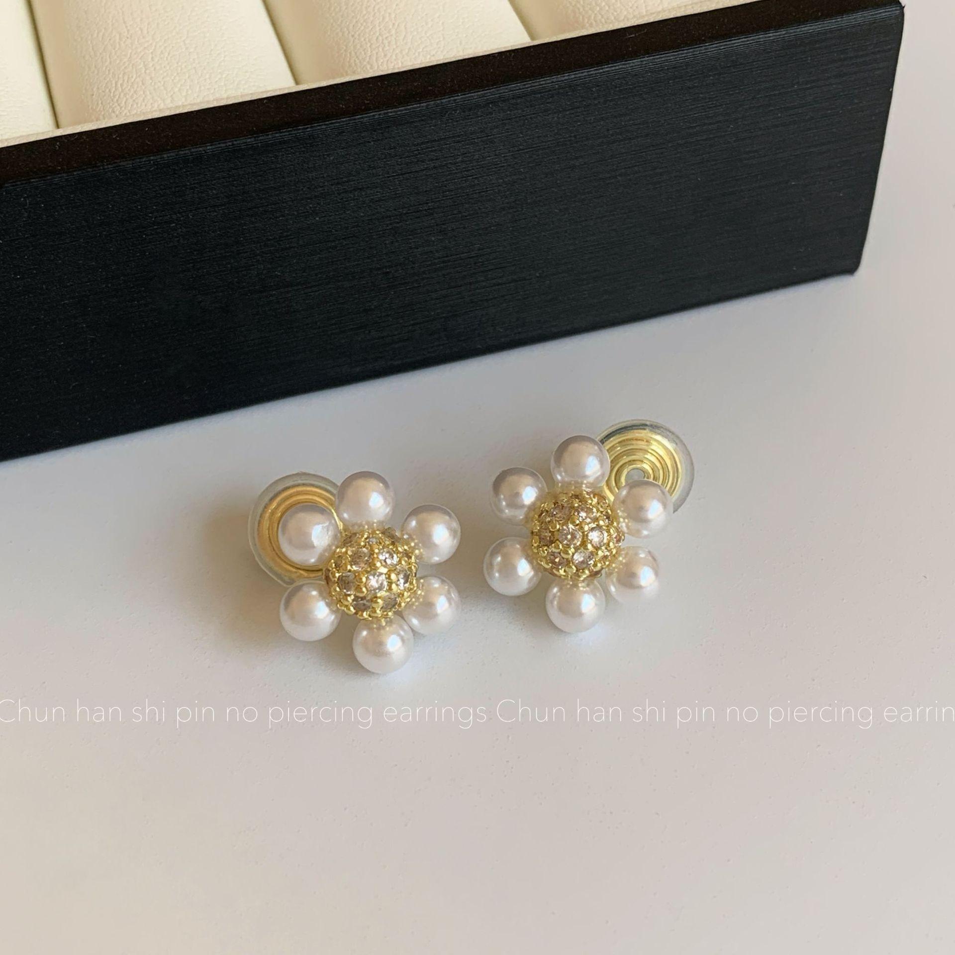 

New pearl flower pearl mosquito coil disc ear clip women s niche high-end stud earrings fashionable versatile light luxury earrings women