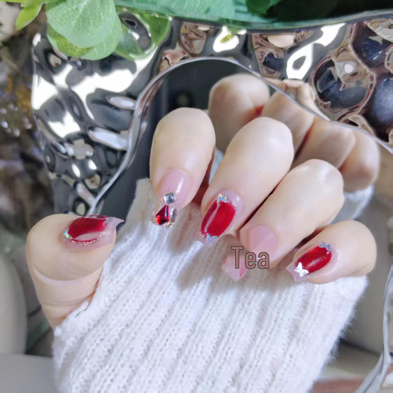 2026 New Year Hand-Painted Fireworks Ruby Cat Eye Nails with Rhinestone Embellishments - Elegant Red Nail Art Small