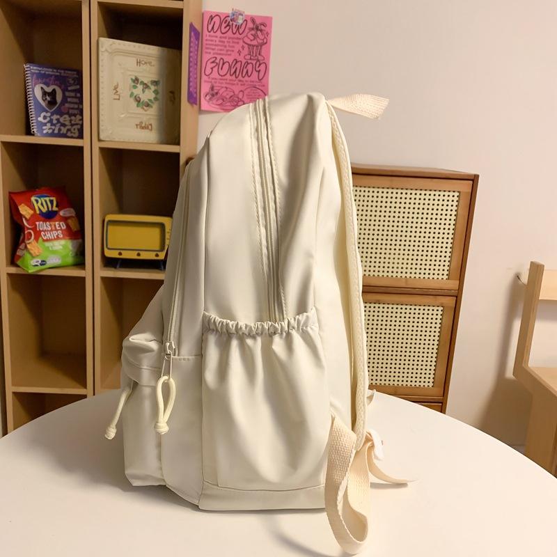 Soft waxy milk yellow backpack female simple versatile ins large capacity high school student junior high school student schoolbag backpack