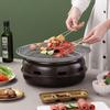 Korean Style Portable Round Charcoal Grill for Home and Outdoor Use.