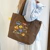 New nylon cute girl embroidered shoulder bag student class bag literary hand canvas bag tide