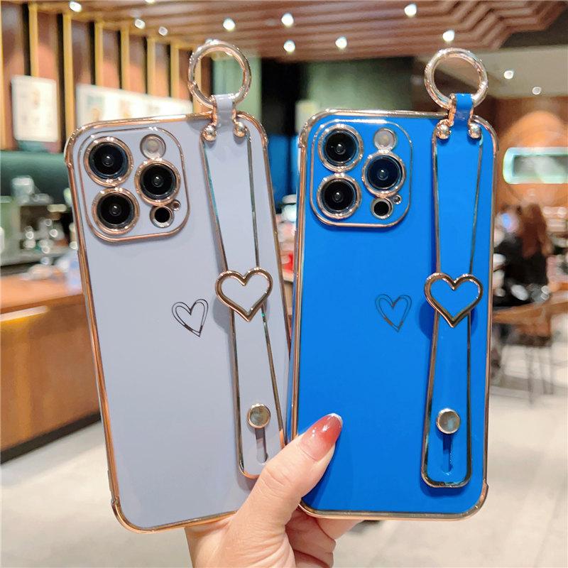 Funda para teléfono con correa de muñeca chapada para iPhone 14 13 12 11 Pro Max Xs Max Xr 13pro 14 Plus 11 a prueba de golpes suave parachoques amor corazón cubierta