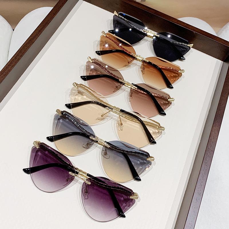 Snake Leg Rimless Trimmed Cat Eye Sunglasses Personalized Sunglasses Spice Girl Sunscreen Women'S Large Frame Sunglasses