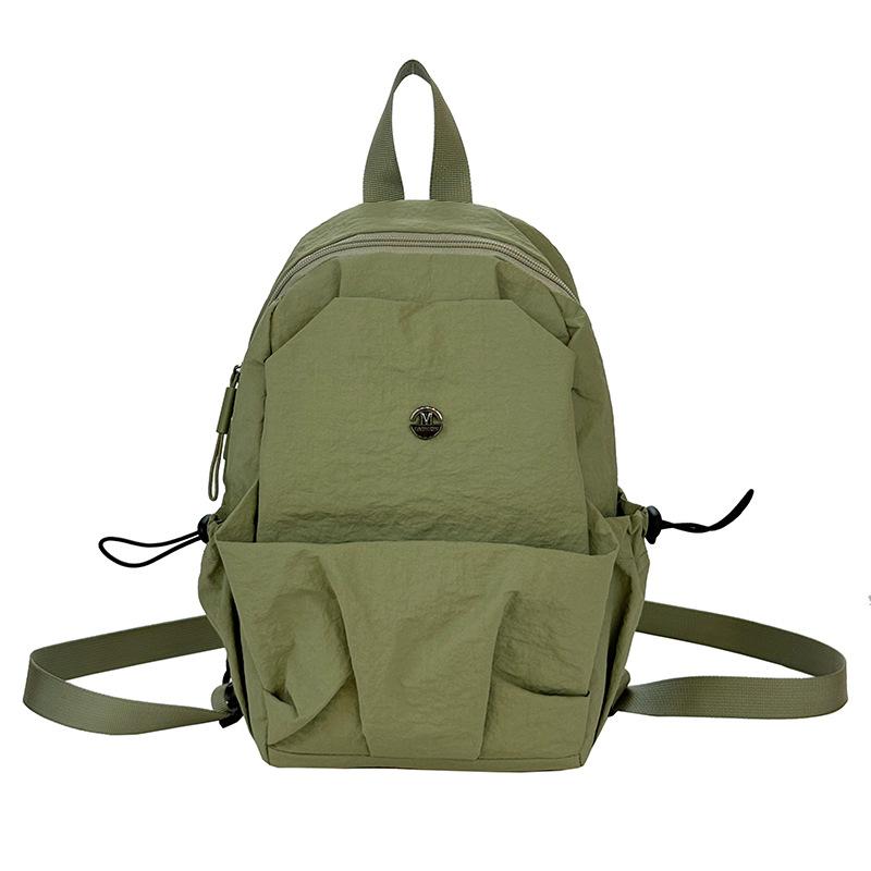 Schoolbag new solid color lightweight small backpack women's simple large capacity breast bag leisure travel commuting versatile portable small 