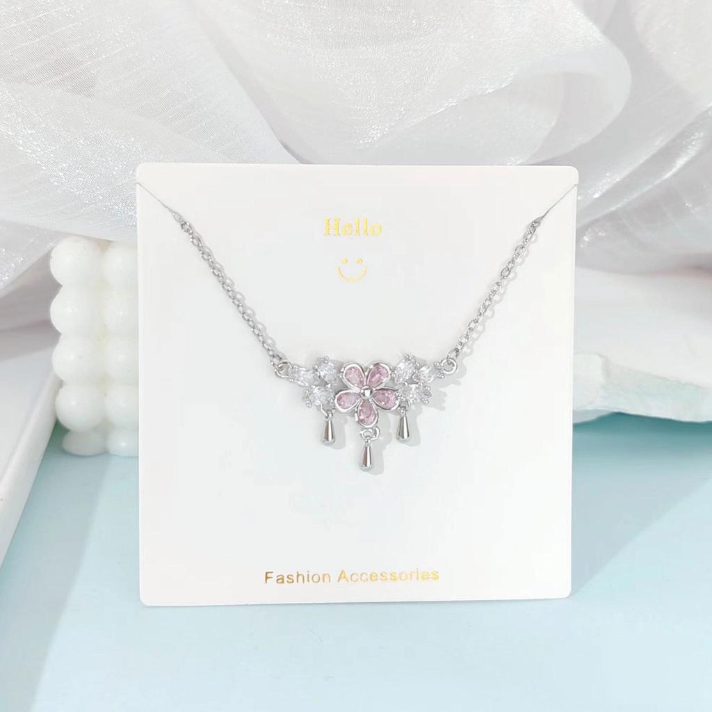 Pink Zircon Gourd Pendant Necklace with Floral Tassels - Titanium Steel Clavicle Chain for Women's Light Luxury.