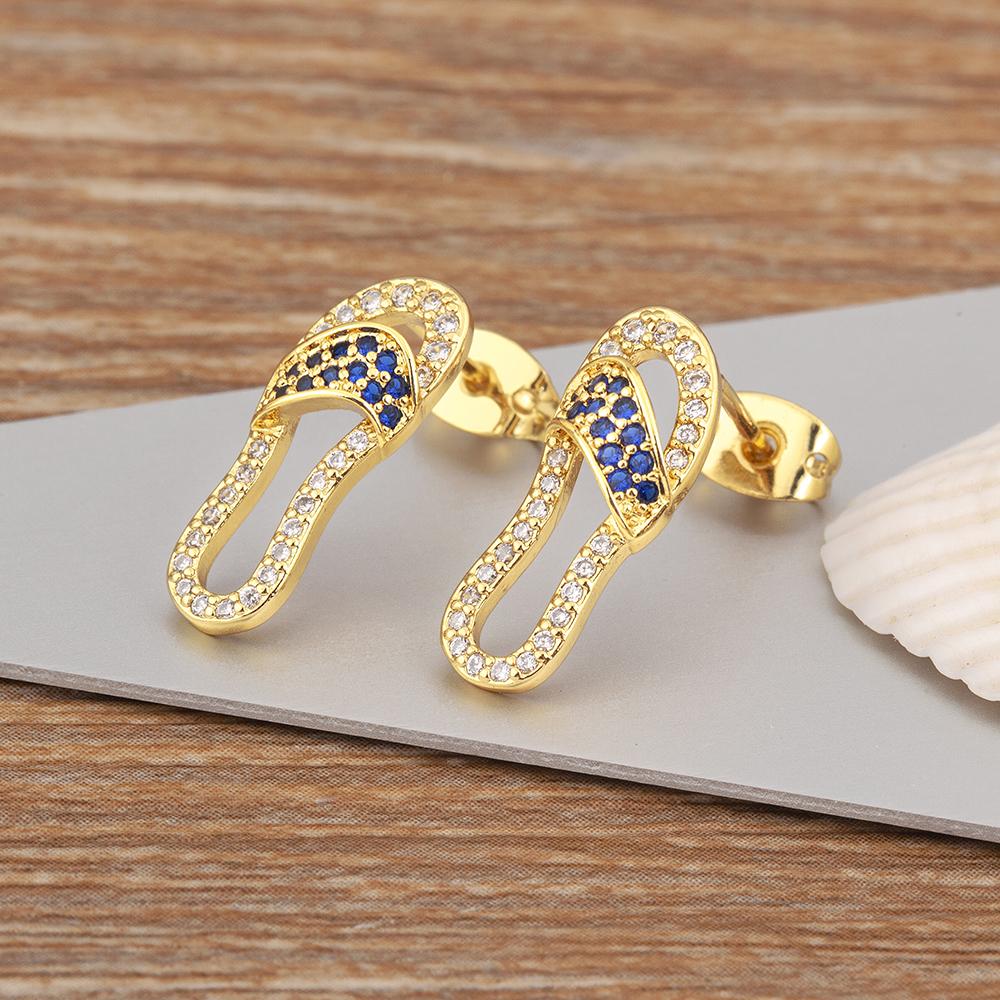 

Nidin New Arrival Hot Sale Slippers Shape Hollow Design Zircon Stud Earrings For Women Girl Personality Jewelry Accessories Gift темно-синього кольору