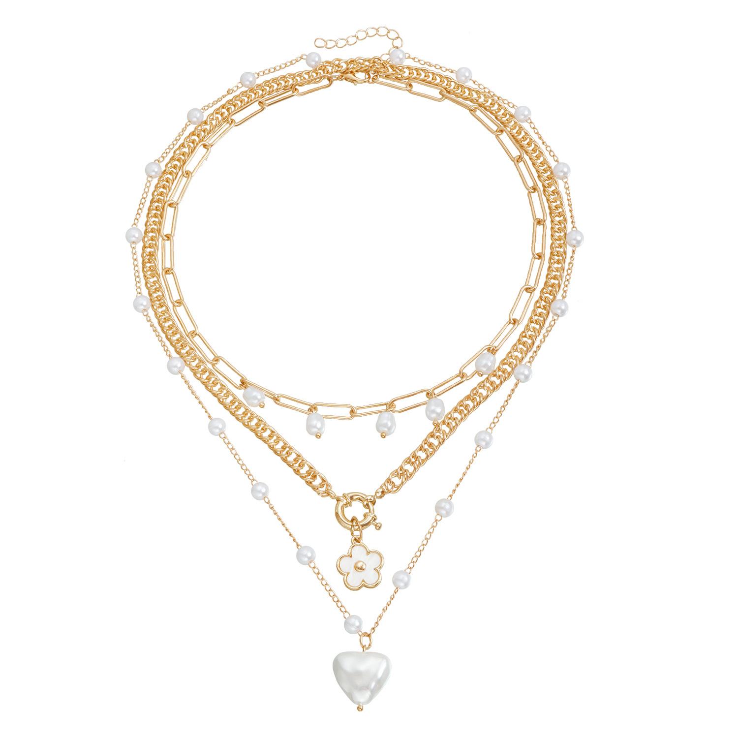 European and American jewelry popular retro five-petal flower imitation pearl love necklace female elegant sexy necklace золотой