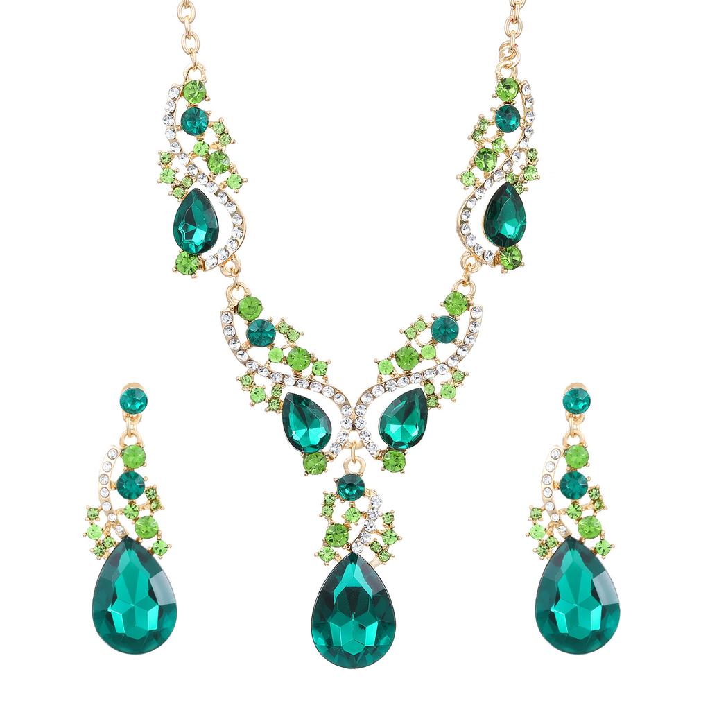 Overdreven banket smaragd ketting oorstekers set