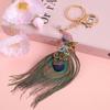 Porte-clés Plume de Paon Strass Brillant Fermoir Anti-rouille Pendentif Mode pour Sac Décoration de Clé de Voiture Portable pour Filles